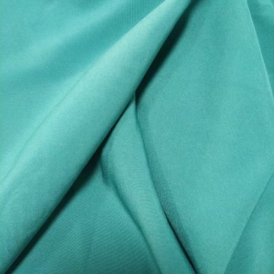 Tejido DTY de poliéster súper suave, rápido y seco para pantalones de mujer