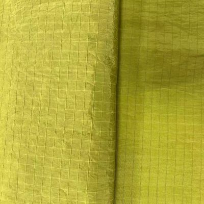 Tejido recubierto de agua repelente de metal brillante recubierto de 210D UHMWPE Gridstop Nylon para chaqueta