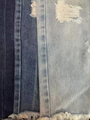 Modelo de hilo teñido 230gm 100% de algodón Twill competitivo Tejido de denim lavado para jeans